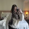 kari_em