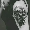 aura.noire.tattoo