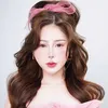 Miss Yumi Ding