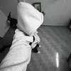 M.