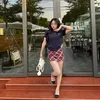 Cô gái mắt tít