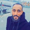 الشاعر أكرم الزوي