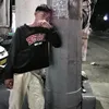 J.