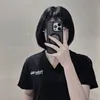 T A
