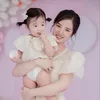 Mẹ bé Vy nè