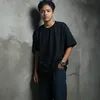 J.