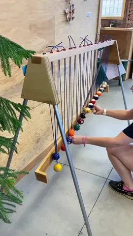 A visualization of waves/oscillatory motion. The period of each ball is determined by the length of the string. #physics #Science #stem #scicomm