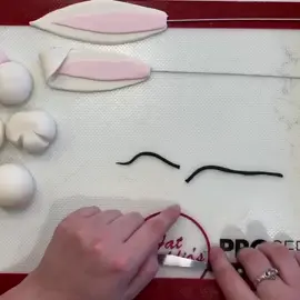 Bunny Cake Pt 1 - make the bunny features with white, pink and black fondant. Let dry for 2 hours. #foryou #WerkItFromHome #bringitback #cakevideo