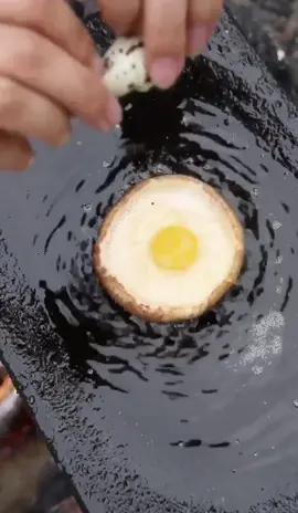 A 🍄 with a bird 🥚= 😋 #yummy #new #mushroom #cooking #Outdoors #campingfood #camping #tiktokfoodie #outdoorchef #firecooking #birdegg #camprock #fy