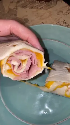 Hot ham and cheese roll up in less than 60 seconds! #snack #food #cooking #easycooking #oneminutevlog #FoodLover #tiktokfood #lovefood #fyp