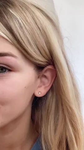 Somebody help my piercing is literally closing over my ear what do I do