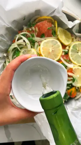 Steamed salmon with onions, garlic and lemons - adapted from What’s Gaby Cooking! (Recipe on her website) #salmonrecipes #foodtiktok #relaxing #salmon