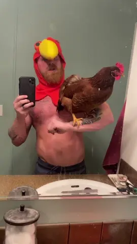 The chicken whisperer. 🐔