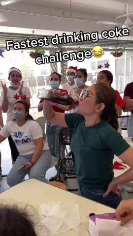 Fastest drinking coke challenge 😂✌️ #cokedrinkingchallege #games #christmasparty #party #fyp #trend