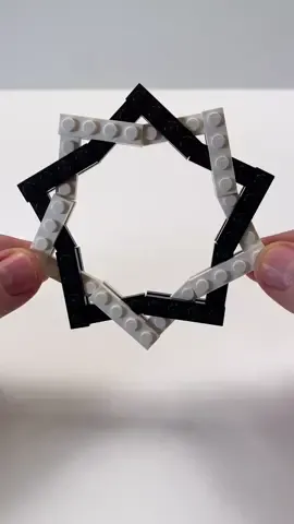 A simple 10 point #LEGO star built from 30 1x4 plates 😊 #brickbending #legoart #bricktok #star #geometric #tenpoint #blackandwhite #fyp #foryoupage