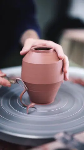 This is how I attach my pots to the wheel for trimming, with a bit of slip and some pressure. #howto #pottery #LearnOnTikTok #oddlysatisfying