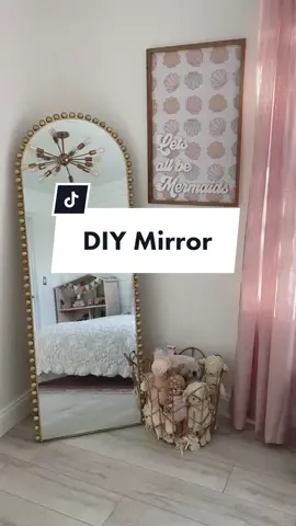 DIY Arched Mirror✨ I spruced up this already perfect mirror from Amazon with a little gold spray paint and wooden balls! Would you try this? #DIY
