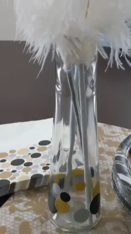 Made confetti vases party decor + 3 to a table, with ostrich feathers #cricut #cricuthacks #cricutprojects #cricuttutorials #cricuttips #diyhacks