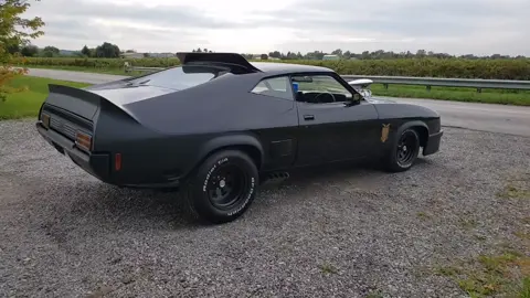Mad Max Interceptor waiting for scoot jockeys