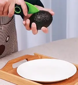 How to use the multifunctional avocado slicer#opener #kitchen