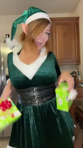 Here kitty kitty who wants a present🎁 #fyp #elf #presents #christmas #happyholidays #dance #cute