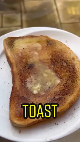 Addicted. What do you rate buttery toast out of ten? #toast #addicted #butter #viral #fyp
