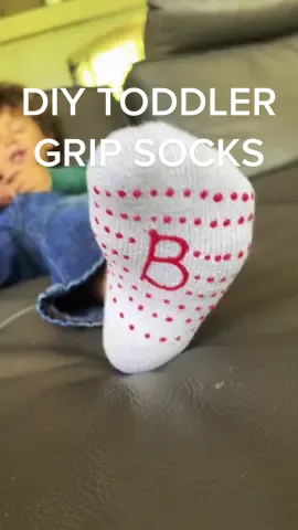 DIY grip socks for toddlers who love to fall 😆. They hold up in the washing machine too! #momhacks #toddlerhack #parenthack #diymom #MomsofTikTok