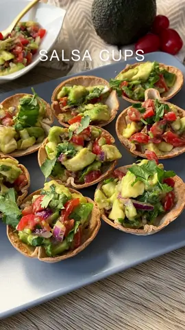BAKED TORTILLA CUPS WITH AVOCADO SALSA🍅🥑🧄 Need inspiration for your next BBQ? This 15 min recipe is a perfect starter or side dish! Another way of serving a delicious avocado salsa - you will love it! 💚  For 12 Cups: 3 Tortilla wraps  SALSA: 1 avocado 1 red onion Handful cherry tomatoes Handful cilantro Salt and pepper to taste Olive oil & lemon juice#salsa #tortilla #vegan #veganrecipes #vegantiktok #plantbasedtiktok #Foodie #veganfood #healthyrecipes #healthyfood