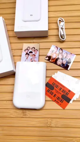 Mi Pocket Photo Printer                                   A unique way of printing images from your smart device's gallery, this Xiaomi Pocket Photo Printer produces clear quality photos that you can either share or frame. Just peel off the sticky back for it to become a sticker. The Zink(zero ink) technology does not use ink or any wasteful cartridges. #pyrlifestyle #miphotoprinter #photo #portableprinter #bts #btsarmy #jungkook #jimin #v #suga #jin #taehyung #jhope