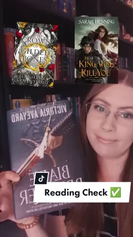 The lighting is weird because I have pink curtains 😂 #BookTok #books #readingcheck #readingupdate #cr #currentlyreading #bloodandash #jla #frombloodandash #crownofgildedbones #kingdomoffleshamdfire #carryon #bladebreaker #tbr #recentlyread #fangirl #thiswovenkingdom #akarnae #themedoranchronicles #lynettenoni