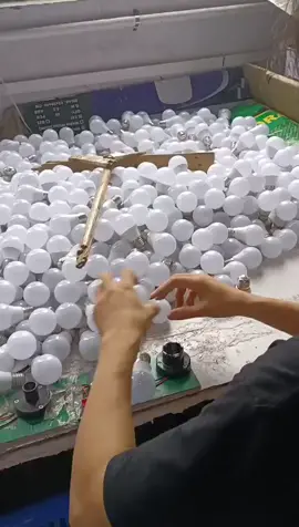 Checking a bulbs in China #china #business #lighting