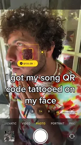 ya… i actually got the QR code for my song tattooed on my face