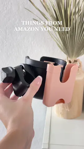 If your stroller doesn’t have a cup holder you need this one from Amazon! I’m obsessed! It fits my Stanley cup and phone. It comes in multiple colors plus it’s $10! Linked in my bio 🫶🏻 #foryou #foryoupage #MomsofTikTok #momlife #strollercupholder #amazon #amazonfinds #babyproducts #productsyouneed