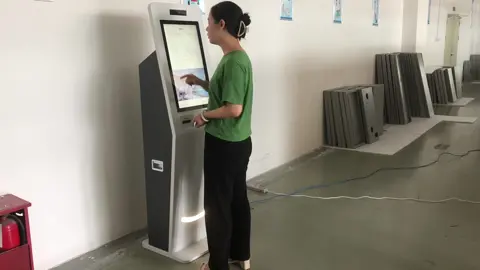 Porfit able and Sleek Hotel check-in kiosk from Hongzhou Smart #Hotelkiosk #smarthotel #hotelcheckinkiosk #hotels #hotelcheckout #Hotelkiosk #kioscos