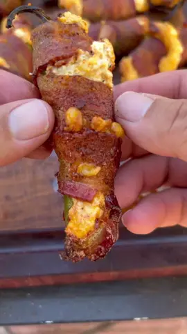 Chorizo and cheese smoked jalapeño poppers.  . Smoked at 300 until the bacon is nice and crispy. I used beef chorizo, cream cheese and a Mexican blend of cheese, along with thin sliced bacon.