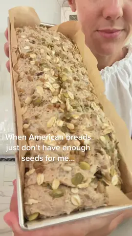 …I bake my own German Kastenbrot (pan bread) with LOADS of seeds! 😍 For this one, I used overnight-soaked pumpkin seeds, sunflower seeds, oats and chia seeds. Then added boiled barley into the dough. Finally you roll it in even more pumpkin seeds before transferring to the pan and giving it its final rise 🙌🏻 this is an altered recipe by the famous German baker Lutz Geißler. I am slowly baking myself through the my newest book I picked up in Germany a few weeks ago and I’m not mad about it 😍😍👌🏻 Zoë loved it too! #b#breadbakings#sourdoughg#germanrecipeb#brotbackens#sauerteigbrots#sourdoughbreads#seededbreadlutzgeissler