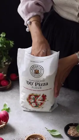 The secret to a fluffy and perfect rising pizza dough is high-quality flour! With #kingarthurbaking  00 Pizza Flour, you can make the perfect pizza with a crispy crust and chewy interior crumb directly in your home oven. I use + enjoy King Arthur because I can always count on it when trying all types of dough recipes, and it gives the best results every time. A delicious combination of juicy birria and pickled onion and radish on a crispy pizza crust! #baking #baketok AD