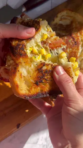 This sandwich is dedicated to #cornboy …and if you don’t know who that is, please check @recesstherapy  and watch their original interview with him to find out…I love him 😍😅 I had zero plans for a recipe with corn, but then this song came out and I knew what had the be done 🌽This is a sourdough grilled cheese with grilled corn + shallots, crispy bacon, and a garlicky cilantro lime sauce…’I can’t imagine a more beautiful thing’ (corn boy’s words, not mine!)…#fyp #itscorn #grilledcheese