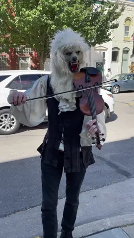 The #ViolinMonster howls for tips. #violin #monster #halloween #saxsquatch #streetperformer 