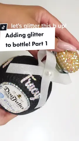 Adding glitter to a birthday bottle!  #glambottle #glitterbottle #birthdaybottle #giftideas  #DIY #craft #crafting #tutorial #SillyCrafting #doityourself #diypartydecor #decor 