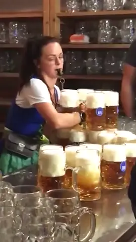 Waitress Carries Multiple Heavy  Beer-Filled Mugs Together #beer #munich #funny #fyp