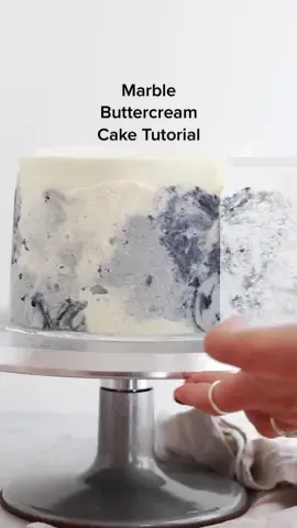 (ad) Marble Buttercream Cake Tutorial ✨ inspired by the gold/marble STIR collection of baking and cake decorating products exclusively at @joannstores! Full tutorial at sugarandsparrow.com/marble-buttercream-cake-tutorial⁣ ⁣ 1️⃣ Frost a smooth buttercream finish on your cake and place it in the refrigerator for at least 30 min. Meanwhile, spread swatches of the marble buttercream onto a sheet of pre-measured parchment paper. The parchment should be as long as the circumference of your cake.⁣ 2️⃣ Wrap the marbled parchment around your (chilled) frosted cake and smooth it down with an icing smoother, then place the cake back into the refrigerator for another 30 minutes.⁣ 3️⃣ Gently unwrap the parchment to reveal the marbled buttercream beneath⁣ 4️⃣ Paint the raw edges gold. I used a mixture of gold luster dust + lemon extract to create the edible gold paint. ⁣ ⁣ #handmadewithjoann #joannpartner #marblecake #cakedecorating #baking #bakedfromscratch #cakeideas #buttercreamcake #bake #cakesoftiktok #cake #buttercream #cakelover #cakeart #cakesoftiktok 