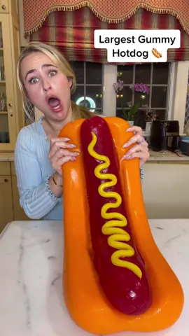 Giant Gummy HOTDOG 🌭 so Yummy and chewy! probably the worlds largest? @daniellegansky has the best ideas #gummies #hotdog #funny #candy #gummybear #funfood 
