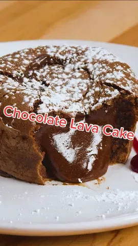 Chocolate lava cake; they look impressive but are surprisingly easy to make. The soft and warm chocolate cake outside and the creamy, gooey chocolate interior make every bite dangerously delicious. #Foodie #food #Recipe #chocolatecake #chocolate #lavacake #chocolatelavacake #chocolaterecipe #chocolatelover  #easydessert  