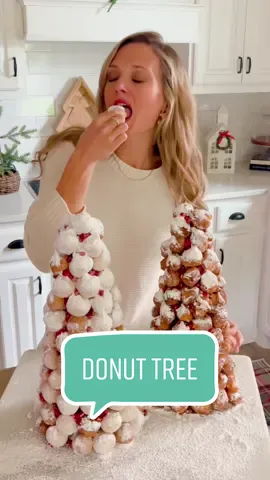 A fun and easy idea foe christmas bruncj! Find the full recipe at https://lifebyleanna.com/the-surprisingly-simple-donut-christmas-tree-thats-beautiful-and-delicious/. #christmasrecipe #challenge #christmasfood 