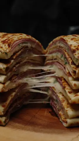 Crepes with Ham & Cheese 🥞   📕Recipe here  ❂ Crepes Dough Ingredients:  350ml. Whole Milk 200g. Flour 2 Large Eggs 25g. Vegetable Oil 25g. Sugar 1/2 Tsp Salt 200ml. Boiling Water  Put all ingredients in a blender and blend for 1-2 minutes (easy peasy). If you want to make the dough without a blender, sift the flour and then, while stirring with a whisk, gradually add eggs, milk, oil, sugar, salt and then boiling water (beat the dough until the dough becomes homogeneous).  ❂ Filling Ingredients:   Ham Mozzarella Cheese Chives  ❂ Cooking process:  Preferably use a crepe pan with low sides.  Fry the crepe on both sides, then put the filling in the middle of the crepe and fold it into an envelope. Done. It’s realy easy.   Bon Appetit!   #crepes #hamandcheese #EasyRecipes #fyp #foodporn #Foodie #cooking #streetfood