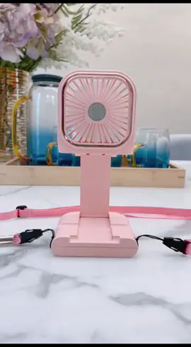 Do you think it's just a fan that can be hung around your neck? It can also be used as a power bank and a mobile phone holder. It's so convenient.#fyp #fypシ #minifan #neckfan #powerbank #cool #goodthing #homegoods #tiktokph #foryou 