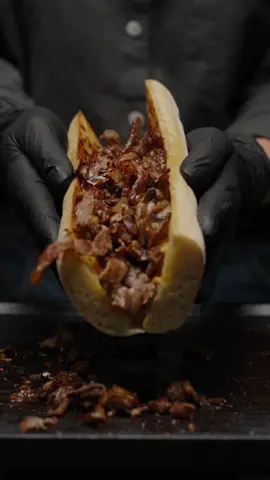 Kinda Philly Cheese - toast of the week #5 📕 Recipe here:  ❂ Ingredients    - Ribeye steak   - Mushrooms (0.7 lb. / 300 g. “Baby Bella” or Champignons)  - Onion (1/2 white onion)  - Garlic (2 cloves of garlic)  - Butter (0.1 lb. / 50 g.)  - Baguette (Originally Hoagie roll)  - Provolone Cheese (3 slices)  - American Cheese (2 slices)  - Truffle Oil (to taste)  - Salt and Pepper (to taste)   ❂ Cooking process  - Chop Mushrooms and Onion   - Cut the Steak into thin slices  - Squeeze the head of Garlic into the oil  - Slice the Baguette and brush with Garlic Butter  - Fry the inside of the Baguette until golden brown  - Fry the Mushrooms and Onion  - Fry the Steak to your favorite condition (We fried until “well done” / until golden brown)  - Add fried Mushrooms and Onion to the Steak  - Form a mound of the fried mix in a pan to the size of your Baguette and place 3 slices of “Provolone” cheese and 2 slice of “American” cheese on a top  - Pour a little truffle oil  - Put the “Philly” mix inside the baguette (The most convenient way to do this is to put the opened baguette on a top of the fried mix in the pan and use a wide spatula to turn the baguette over)  Bon Appetite! 😋 #phillycheesesteak #steaksandwich #Foodie #foodporn #cooking #EasyRecipes #fypシ 