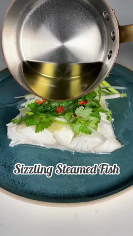 So delicious, simple and quick to make. Pour over the hot oil at the table for the wow factor. Full recipe on my Instagram. #cooking #fyp #food #Recipe #foodporn #foodtiktok #viral #Foodie #dinner #health #healthyfood #fish 