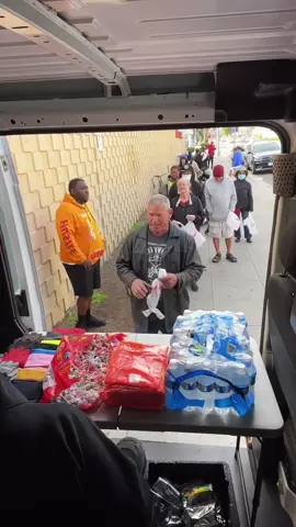 We promised them we would return Thursday with items for the cold and rain. They had choices of beanie colors and gloves along with fried chicken and drinks. 
